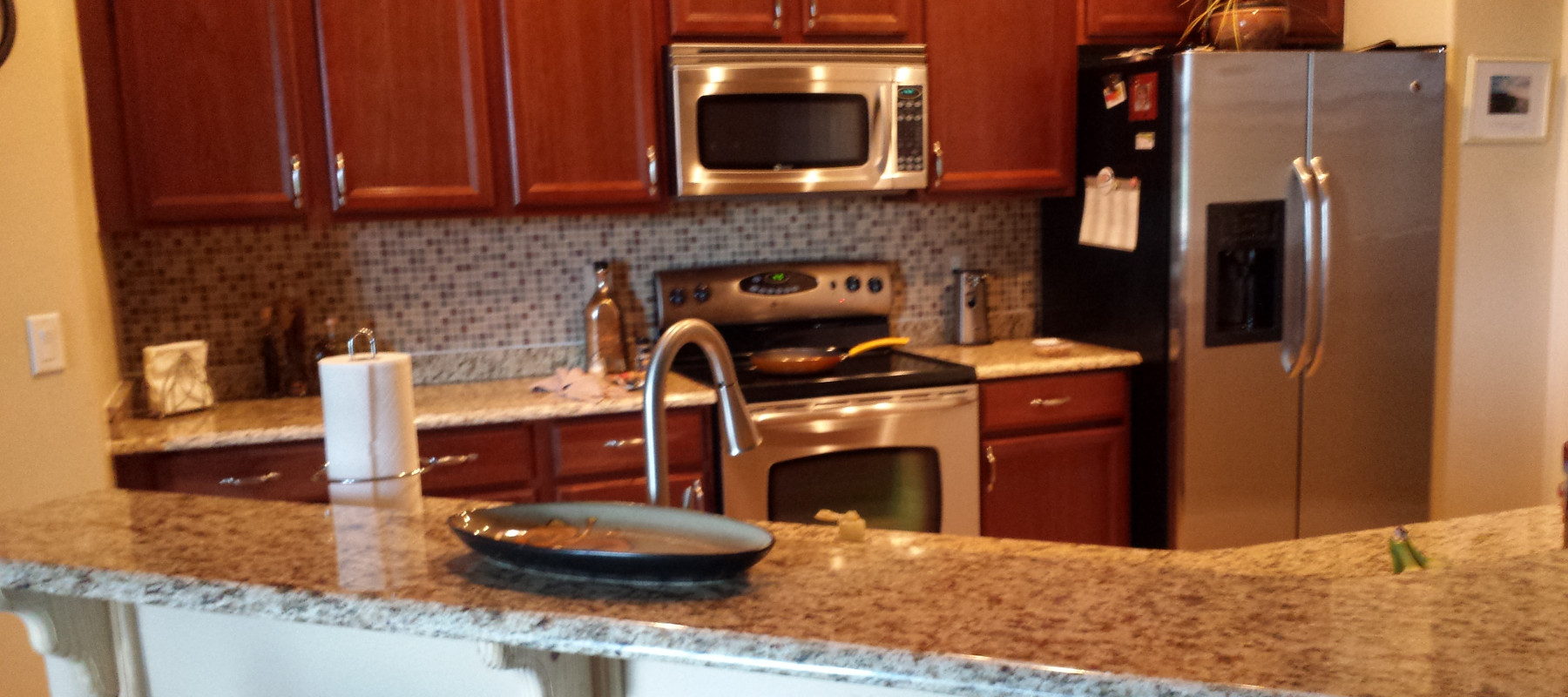 Traditional Transitional Kitchen Remodel in Clermont, FL by The Gallery of Stone project photo 2